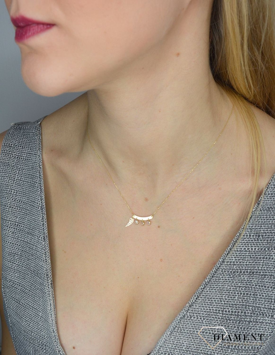 Złoty naszyjnik celebrytka 585 'wiszące cyrkonie z piórem'  NA 1902.jpg